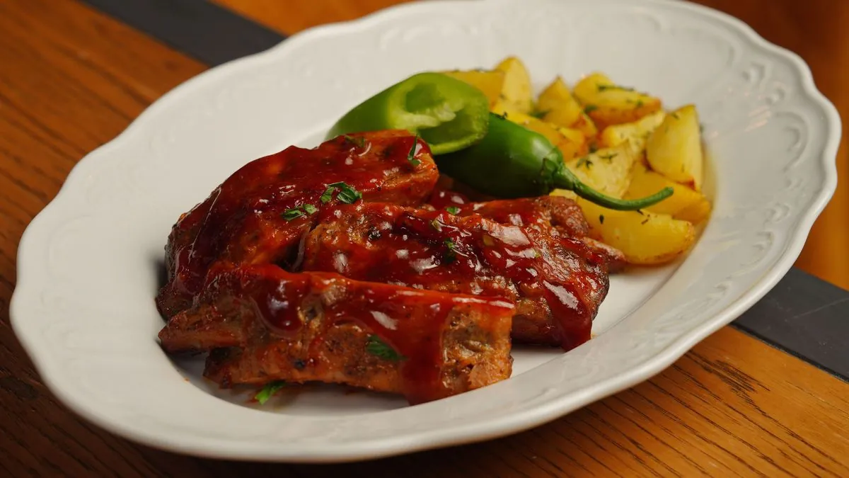 Barbecue-glazed beef patties with roasted potatoes