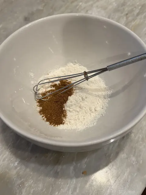 Whisking the flour and paprika together