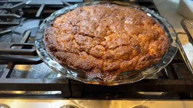The cake out of the oven with its cinnamon swirl