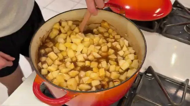 Apple filling cooking in a Dutch oven