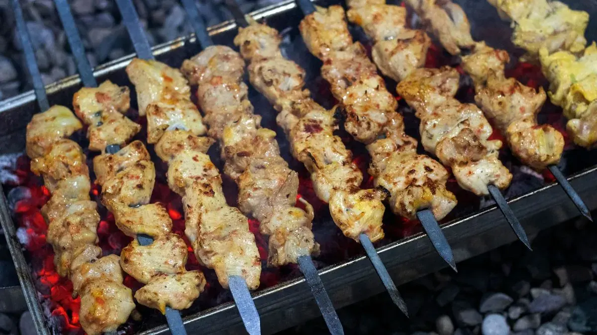 Chicken kebabs on a charcoal grill
