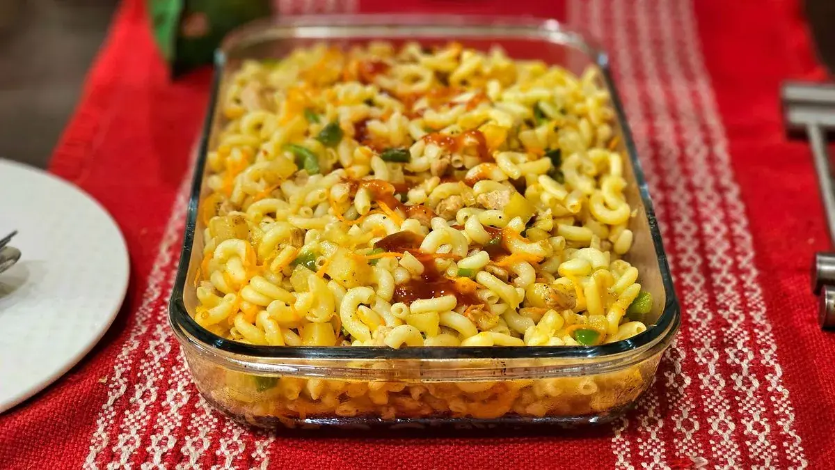 Baked macaroni casserole in a glass dish